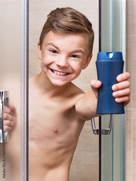 Teen Boy Takes A Shower In The Bathroom Stock Photo Adobe Stock