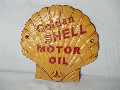 Cast Iron Golden Shell Motor Oil Wall Sign Plaque Clam Shaped Raised