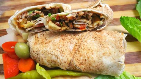 Shawarma is prepared by stacking strips of marinated meat and. ARABIC SHAWARMA RECIPE IN TAMIL/SHAWARMA RECIPE /SHAWARMA ...