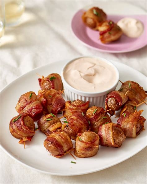 A favorite restaurant of mine serves the yummiest marshmallow dipping sauce with their sweet potato fries, and after begging them for the ingredients, here's the tasty. Bacon-Wrapped Potato Bites with Spicy Sour Cream Dipping Sauce | Recipe (With images) | Sour ...