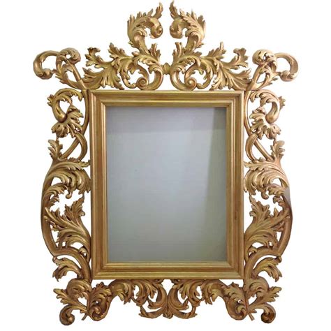 Quite literally reflective, a bathroom mirror is a traditional and functional addition to full baths and powder rooms alike. Gold Leaf Carved Mirror Frame - J. Tribble