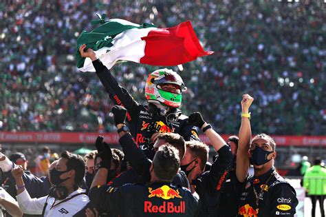 Sergio Perez celebrates a podium finish at the 2021 Mexican Grand Prix