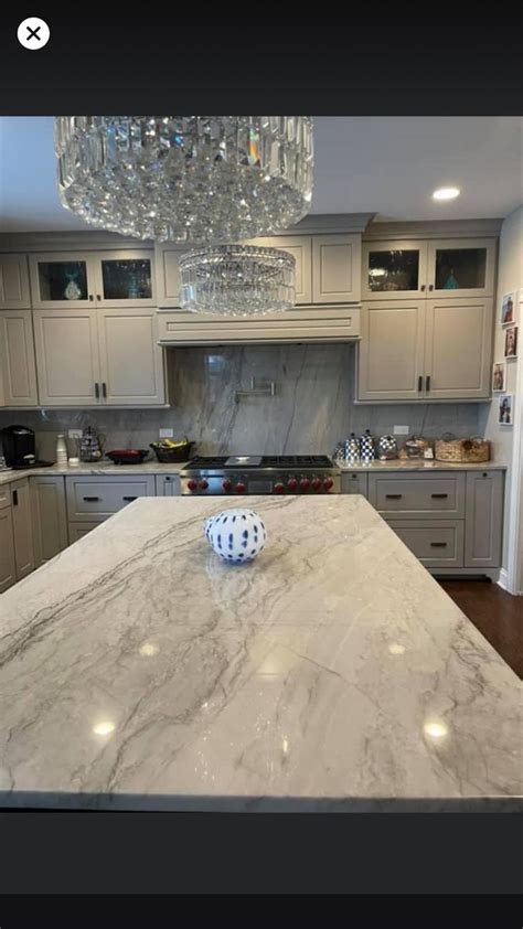 Sea Pearl Quartzite Countertops And Backsplash Lake House Kitchen