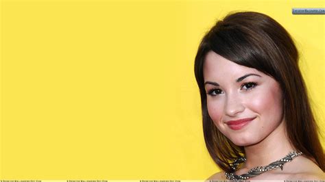 free download demi lovato smiling cute face closeup and yellow background wallpaper [1920x1080