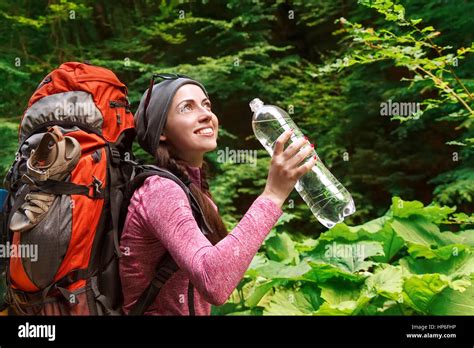 Hiker Girl Drinking Water Happy Woman Tourist With Backpack Drinking
