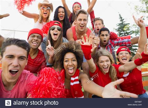 Friends Cheering At Sporting Event Stock Photo Alamy