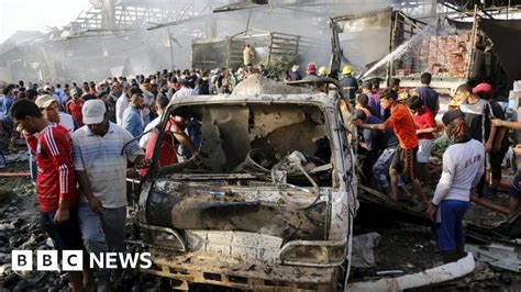 Iraq Truck Bomb Kills Dozens At Baghdad Market Bbc News