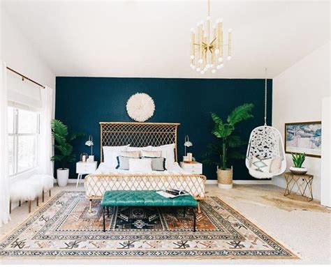 Dark Blue Accent Wall Pops Of Gold And Teal Grounded With Neutrals