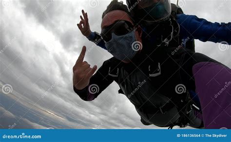 Skydiving Tandem With Protective Mask After The Lockdown Stock Footage