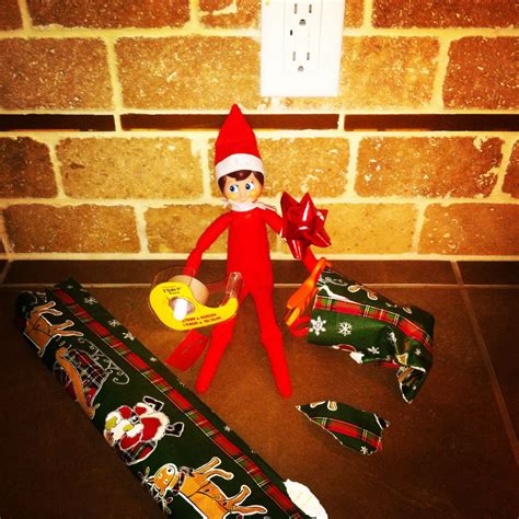 elf on the shelf day 15 caught wrapping presents elf on the shelf elf holiday decor