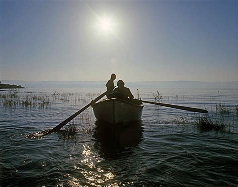 Fishermen On The Sea Of Galilee At Sunrise Israel