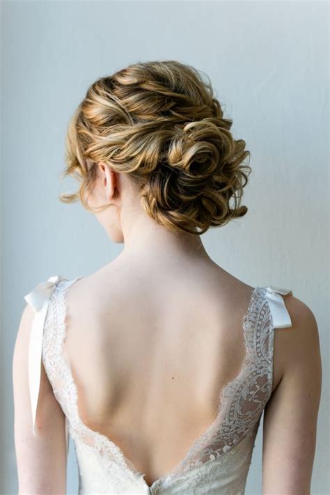 A plain looking woman can look fanciful and elegant in just a snap by gathering her hair up in a messy way. 11 Messy Wedding Hair Updos,messy wedding hairstyles