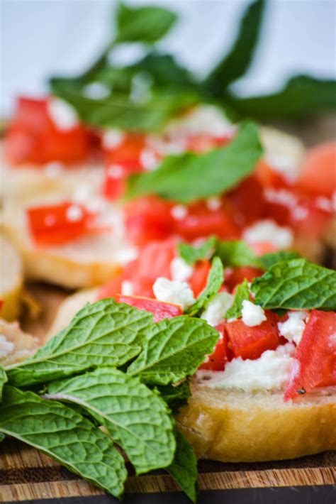 Spread each slice with 1 tablespoon of goat cheese and top with 1 tablespoon of tomato and 1 teaspoon of onion. Mint and Goat Cheese Bruschetta | Elisabeth McKnight