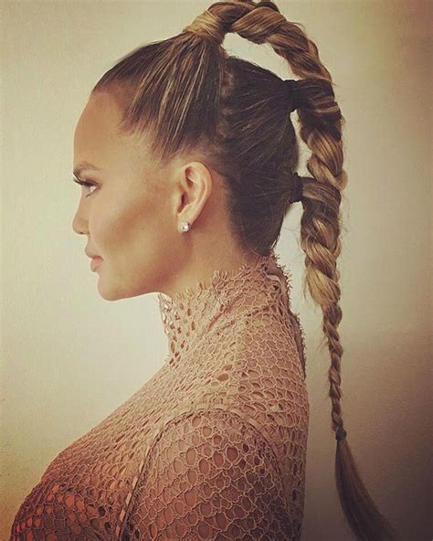 Braids are the best way to emphasize different styles like romantic or boho chic looks. Chrissy Teigen's Futuristic Triple-Braided Ponytail is the ...