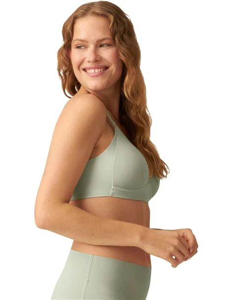 naturana side smoothing soft cup wireless padded bra in pale greenshield myer