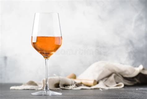 Orange Wine In Big Wine Glass Fashionable Modern Drink Gray Counter