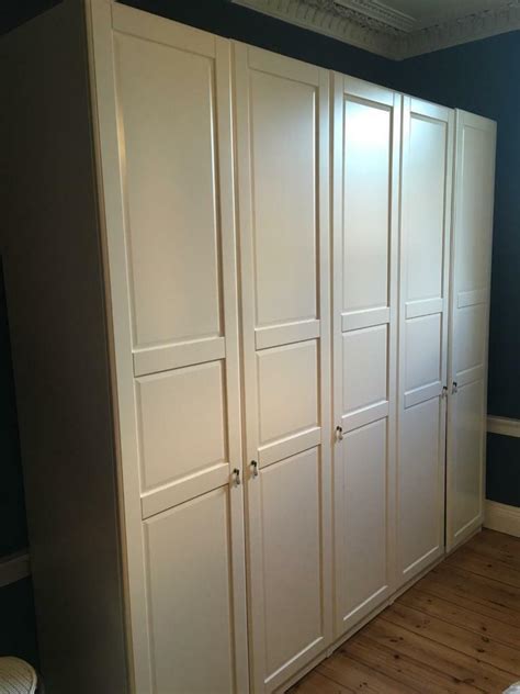 Ikea pax wardrobe is a simple and cool piece for your clothes and shoes though you may say that it looks too usual or even cheap. Ikea PAX wardrobe (tall, white, hinges doors) | in Ferry ...