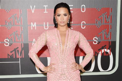 demi lovato takes the plunge in a skintight gown at the 2015 mtv video music awards