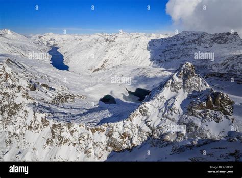 Aerial View Of Snowy Peak Peloso Surrounded By Lago Di Lei Val Di