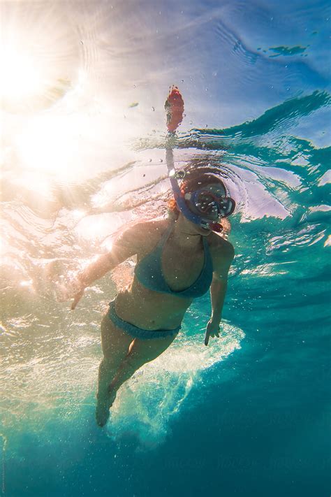 Woman In Bikini Snorkeling Underwater At All Inclusive Caribbean Resort White Sand Beach By