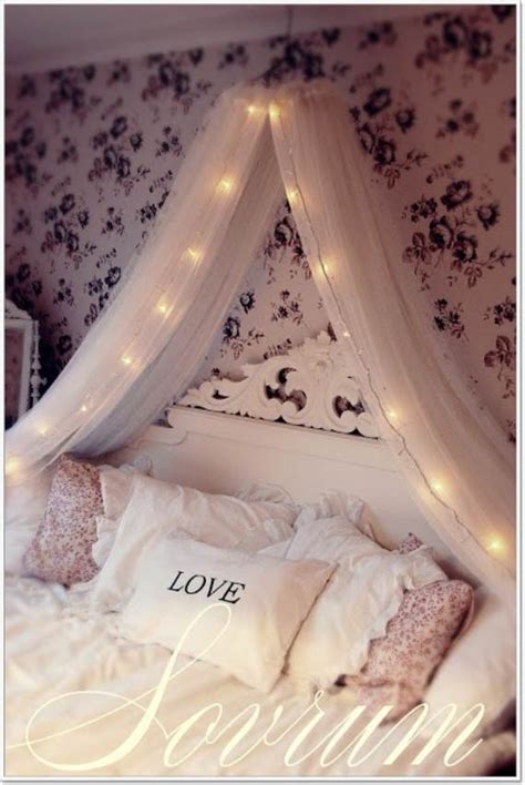 Simply hang sheer drapery panels on wire rope threaded through eye hooks in the ceiling and accent with strings of cascading holiday lights. 45 Atmospheric Holiday Decorating Ideas With Fairy Lights ...