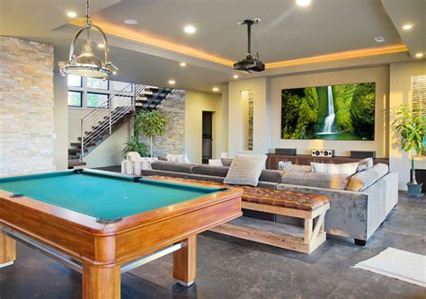 This basement man cave has good a cool, clean look. Montreal Man Cave and Garage Design | Versa Style Design