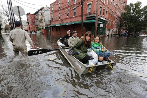 Hoboken Residents Navigate The Floodwaters From Hurricane Sandy As They