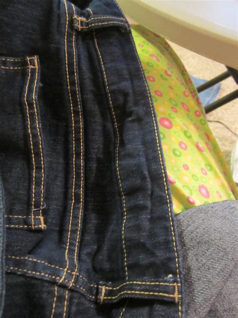 Unfold this crease, then press each long edge in to the center fold line. MEANDERINGS OF THE MIND: Taking in Jeans Tutorial