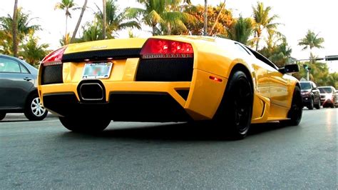 Yellow Lamborghini Murcielago Lp640 Driving On Ocean Drive In Miami