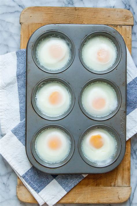 Can You Really Make Poached Eggs In The Oven Kitchn Eggs In Muffin