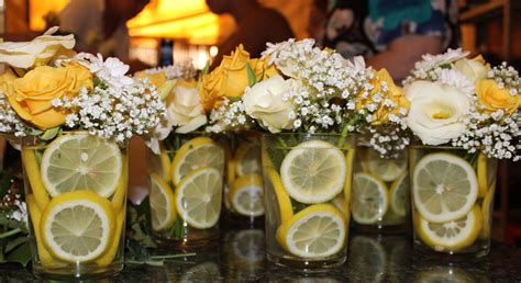 Our Centerpiece For The Tablemade With Yellow Roses And Lemons