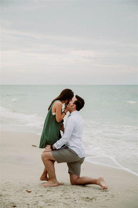Nick And Sarahs Surprise Sunset Beach Proposal Engaged Life Beach Engagement Photos
