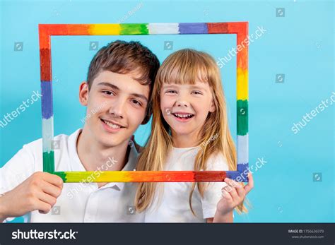 5yearold Girl Teenage Boy Look Camera Stock Photo 1756636979 Shutterstock