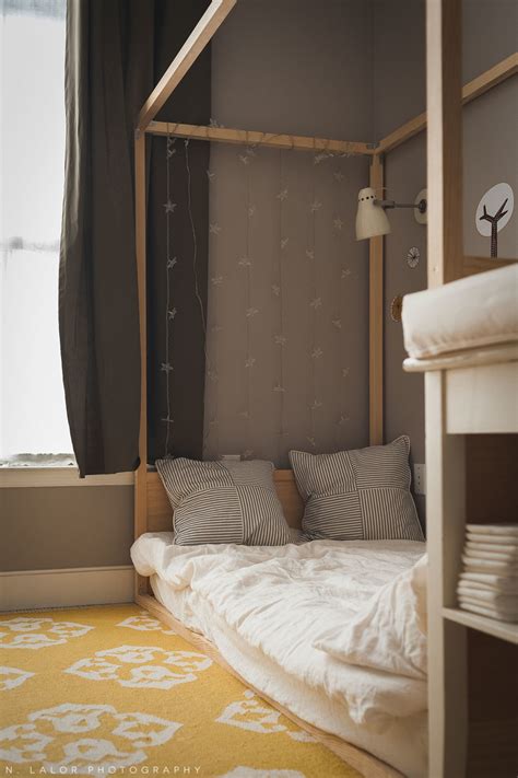 Powder gray is the new white when it comes to wall colors. A Shared Kids Bedroom with DIY Montessori Floor Beds ...