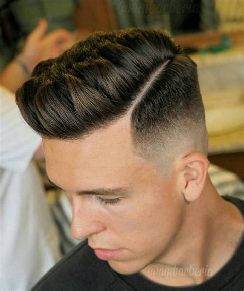 This versatile design can be as clean cut or daring as you like. 20 Top Men's Fade Haircuts That are Trendy Now