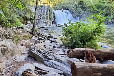 Cades cove is one of the beautiful meadows surrounded by the mountains. THE Cades Cove waterfalls hike to do in the Smoky ...