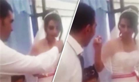 Appalling Video Emerges Of Groom Hitting Wife After She Attempts To
