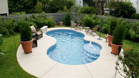 Many homeowners with smaller backyards balk at the idea of getting a pool because they either think it will take up the entire yard, or that such a tiny pool will look funny. 14 Best Small Inground Pool Designs for Small Spaces ...