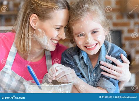 Smiling Mother And Daughter Cooking At Home Stock Image Image Of