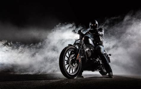 High Power Motorcycle Chopper With Man Rider At Night Stock Image