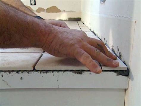 It's easy to click boards together, but how you handle transition areas makes the difference between a professional and amateur looking job. Install Tile Over Laminate Countertop and Backsplash | Laminate countertops, Countertops ...