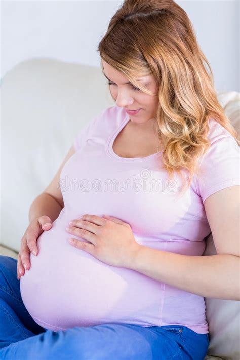 Man Touching Pregnant Womans Stomach Stock Image Image
