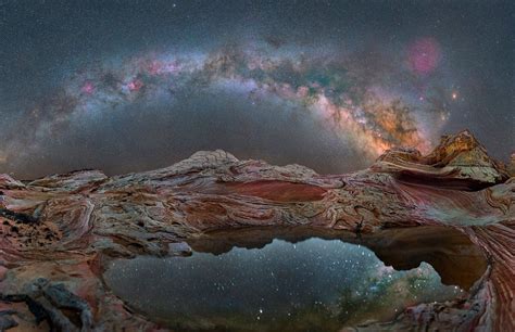 Milky Way Over Swirling Sandstone And A Pool Of Water White Pocket
