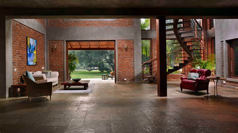 Brick Lined Interiors Open Up To Garden Filled With Fruit Trees At