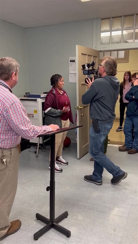 Coach Bourne Is Surprised By Wdam With The Golden Apple Award By