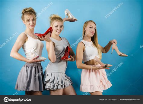 Three Women Showing High Heels Shoes Stock Photo By Anetlanda