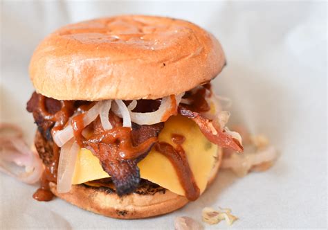 Bbq Bacon Cheeseburger With Two Spoons