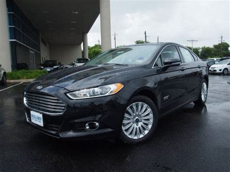 J takes it for a spin and tells you all about it.for the. Sell new 2013 FORD FUSION ENERGI TITANIUM PLUG-IN HYBRID 2 ...
