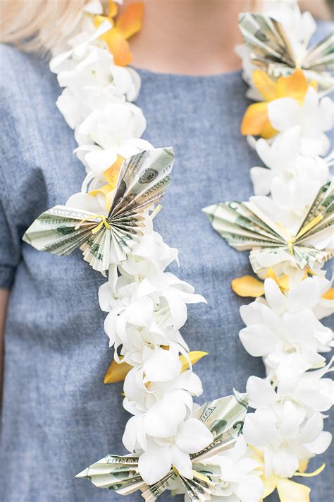 Fold it in half again. 25+ Creative DIYs to Make a Money Lei | Guide Patterns