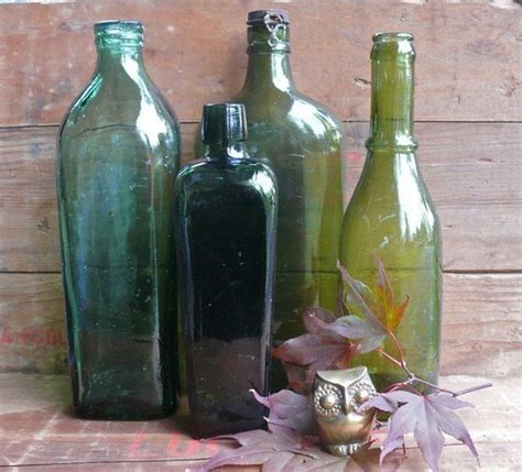 on sale vintage large green glass bottles set of 4